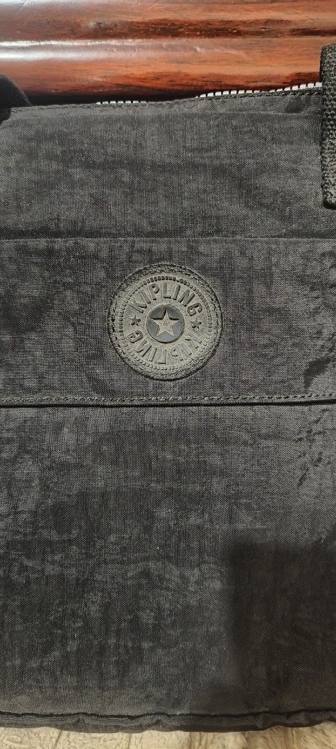 Kipling Laptop Bag BLACK (Category: Laptop Bags & Sleeves) located in Caloocan City. Submitted by thrift2trend (Listing ID 1440452439, Image 2). Description: - Black Kipling laptop bag - Top handles and detachable shoulder strap - Multiple internal compartments for organization - Secure zip-up closure - Durable material - Ideal for work or travel missing monkey. .