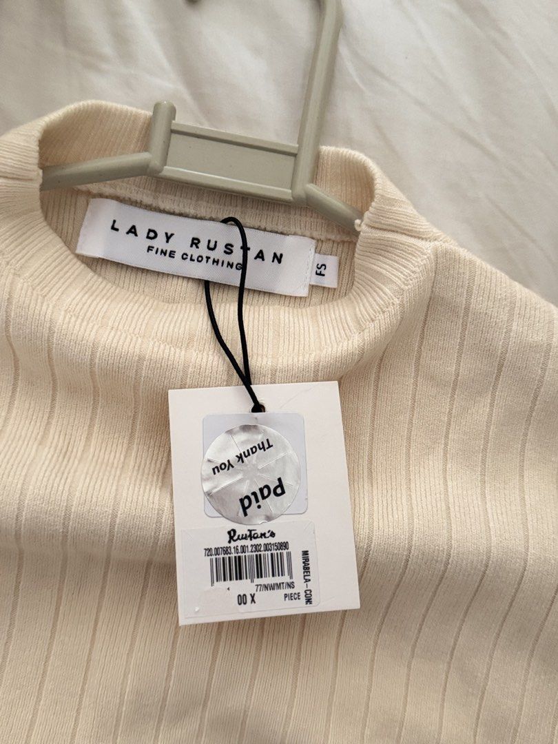 Lady Rustan Knit Top (Category: Sleeveless) located in Quezon City. Submitted by kfrys (Listing ID 1440455504, Image 2). Description: BNWT Size: Free size Original Price: 1,850 Rfs: Decluttering No flaws.