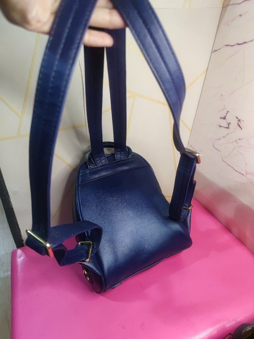 Lapalette Cupcake Blue Sparkly Mini Backpack with Horse Design (Category: Backpacks) located in Dagupan City. Submitted by jhazrightshop (Listing ID 1440429997, Image 2). Description: - Cute blue sparkly mini backpack - Features a horse design with fringe details - Gold zippers and hardware - Adjustable straps for a comfortable fit - Ideal for everyday use or as a fun accessory - Approximately 9 inches tall.