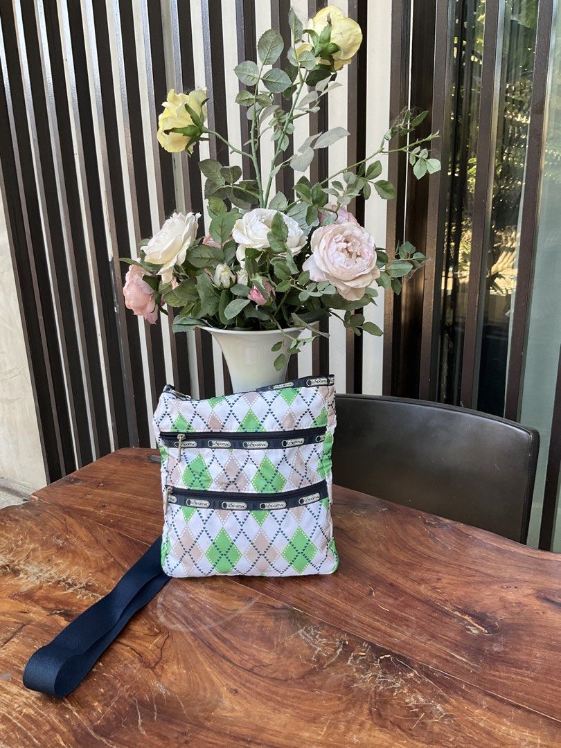 LeSportsac Argyle Crossbody Bag (Category: Cross-body Bags) located in Makati City. Submitted by ehloysah (Listing ID 1440541135, Image 2). Description: - Cute LeSportsac crossbody bag - Stylish argyle pattern - Multiple zippered compartments for organization - Adjustable strap for comfortable wear - Ideal for everyday use or travel - Ample space for your essentials.