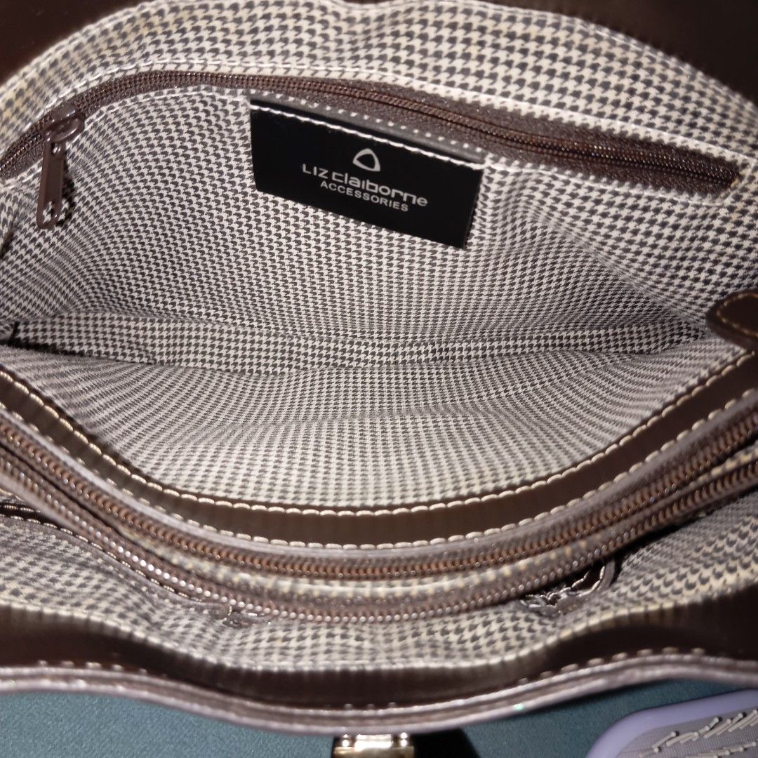 Liz Claiborne Brown Shoulder Bag (Category: Shoulder Bags) located in Mandaluyong City. Submitted by ilightcoproducts (Listing ID 1440509415, Image 2). Description: - Liz Claiborne shoulder bag - Color: Brown - Closure: Flap with silver-tone clasp - Interior: Houndstooth lining with zippered pocket - Material: Leather - Features: Shoulder strap, reinforced corners.