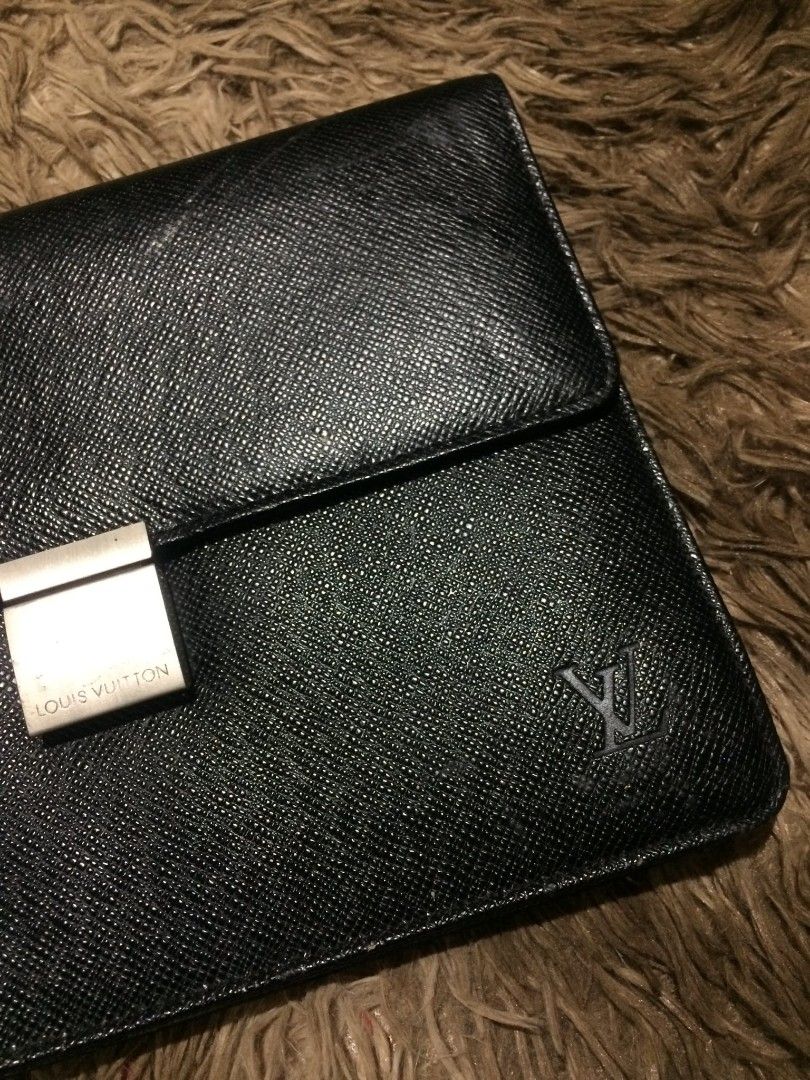LOUIS VUITTON | TAIGA SELENGA CLUTCH BAG (Category: Luxury Bags & Wallets) located in Naga. Submitted by etherealbinsss_ (Listing ID 1440522740, Image 2). Description: Width: 10" Length: 7" Color rate : 10/10 Issue : minimal flaws only Overall, in very good condition Location : Bicol Naga City MOP: Gcash only ( Payment First ) Courier : J&T Express.