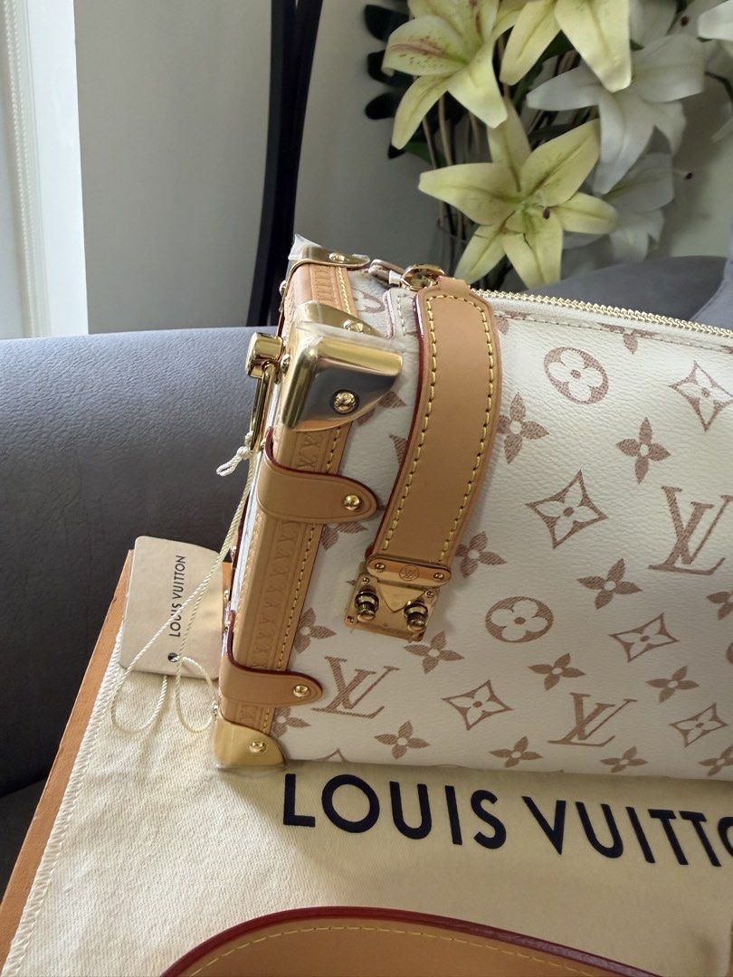 Louis Vuitton SideTrunk MM Dune (Category: Luxury Bags & Wallets) located in Manila. Submitted by az.purse (Listing ID 1440475631, Image 3). Description: - Authentic Louis Vuitton SideTrunk MM Dune - Beige monogram canvas with tan leather trim - Gold hardware details - Detachable shoulder strap included - Detachable wrist strap included - Ideal for evening wear or as a statement piece - Comes with box, dustbag, straps, tags and receipt.