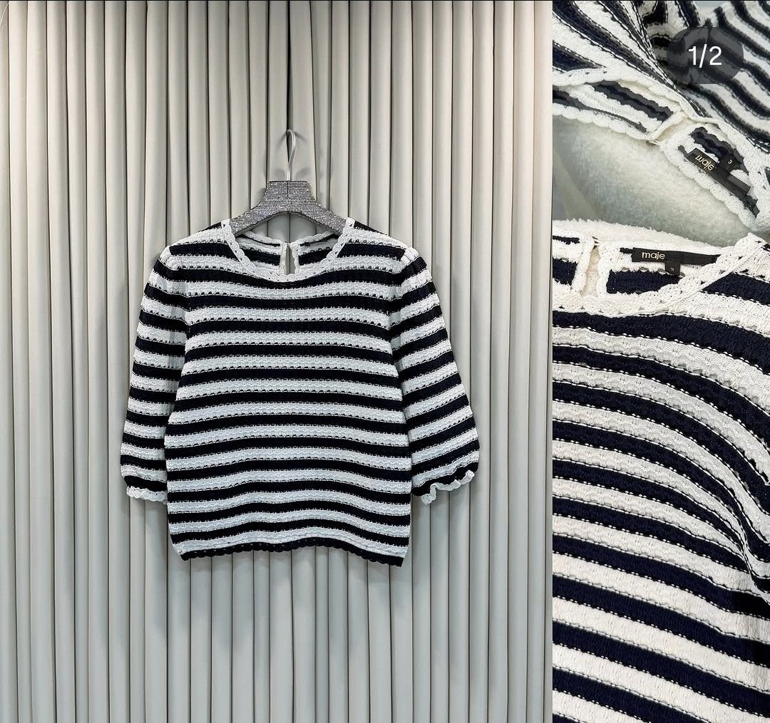 Maje Crochet Effect Striped Knit Puff Sleeve Top (Category: Blouses) located in Manila. Submitted by phyliciamarie (Listing ID 1440549801, Image 1). Description: - Classic black and white striped knit top - Trendy puff sleeves with textured detail - Comfortable crew neck with a stylish keyhole back - Estimated size: Large - Ideal for casual outings and everyday wear.