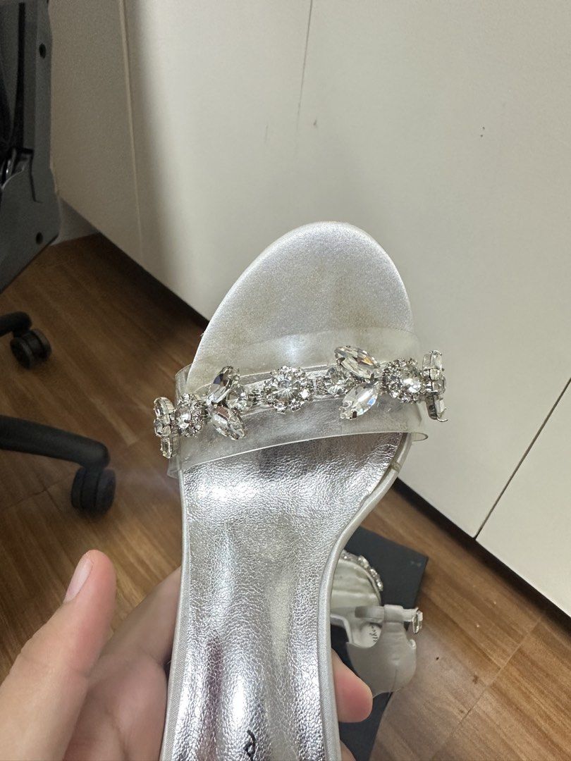 Matthes White Embellished Heels with Ankle Strap (Category: Heels) located in Bulacan. Submitted by elyjgpreloved (Listing ID 1440442238, Image 2). Description: Used twice. My wedding and abay. Na loose thread lang kasi sumabit sa gown ko nung abay ako. - White heels with sparkly embellishments on the strap - Secure ankle strap for a comfortable fit - Sole shows some signs of wear - Includes original box - Size 36.