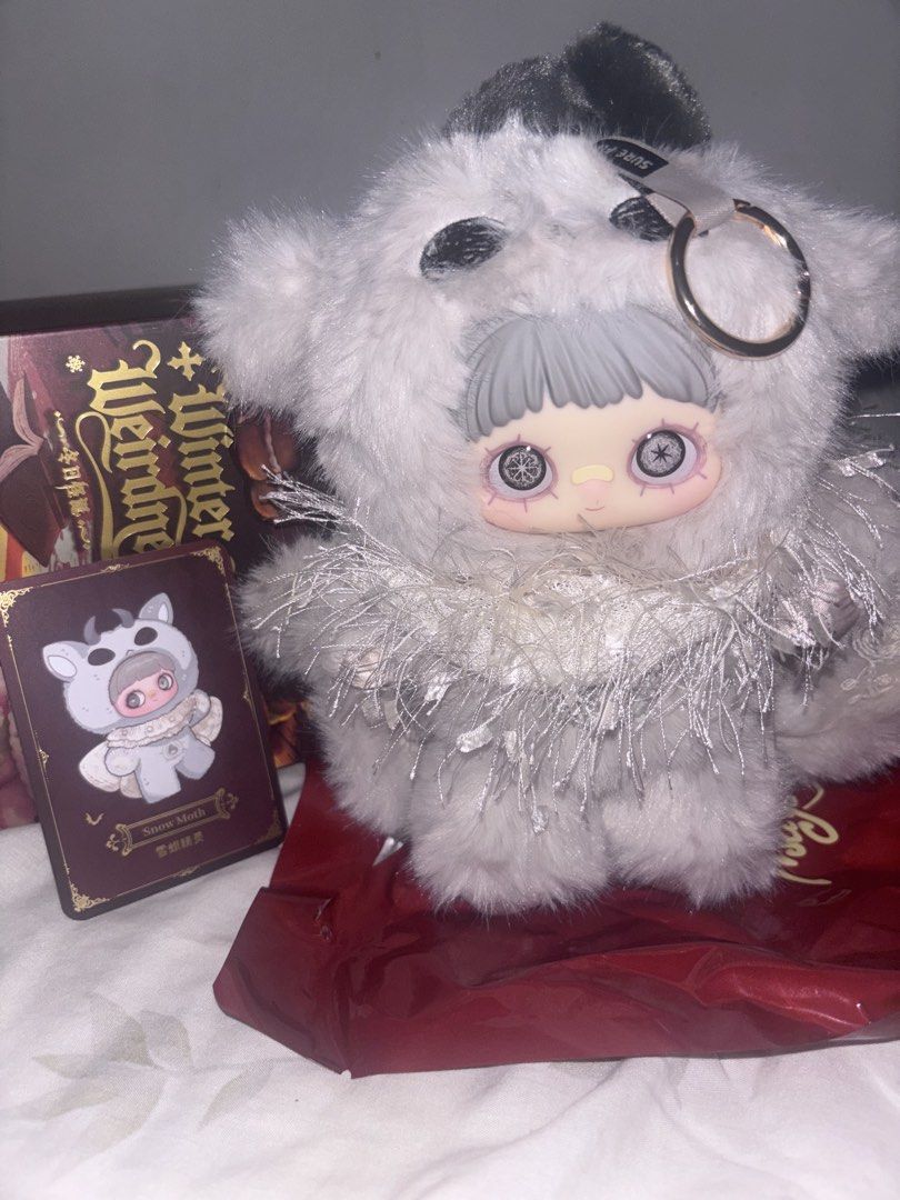 Maymei Winter Weirdness: Snow Moth (Category: Toys & Games) located in San Juan City. Submitted by prancer.09 (Listing ID 1440487574, Image 1). Description: Maymei Winter Weirdness: Snow Moth (opened) - box contains plush pendant, card, foil bag - purchased 2026, barely used and in good condition Mode of Payment: Gcash/Paymaya Delivery: via Lalamove, shouldered by buyer Location: San Juan City area.