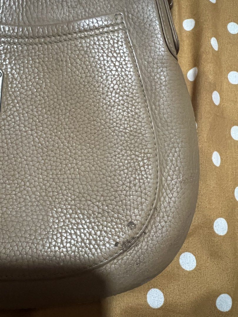 MCM München Leather Hobo Shoulder Bag (Category: Luxury Bags & Wallets) located in Manila. Submitted by jaisailove68397 (Listing ID 1440555381, Image 2). Description: - Authentic MCM München Hobo Bag - Color: Taupe/Light Brown - Material: Pebbled Leather - Closure: Zipper - Interior: 1 Zippered Pocket - Strap: Adjustable with buckle - Style: Classic, everyday bag.
