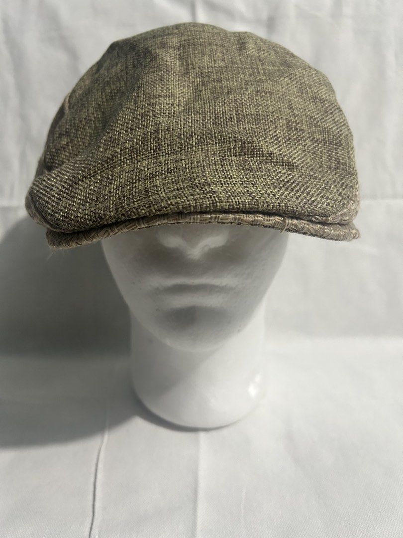 Men's Tweed Flat Cap Hat (Category: Caps & Hats) located in Imus. Submitted by swiftfire_39c538 (Listing ID 1440538369, Image 1). Description: Classic flat cap/ newsboy cap Breathable woven olive green crown with a beige basket weave side panels with adjustable snap button for closure . From Japan Surplus. Preloved . Washed and ready to wear. .