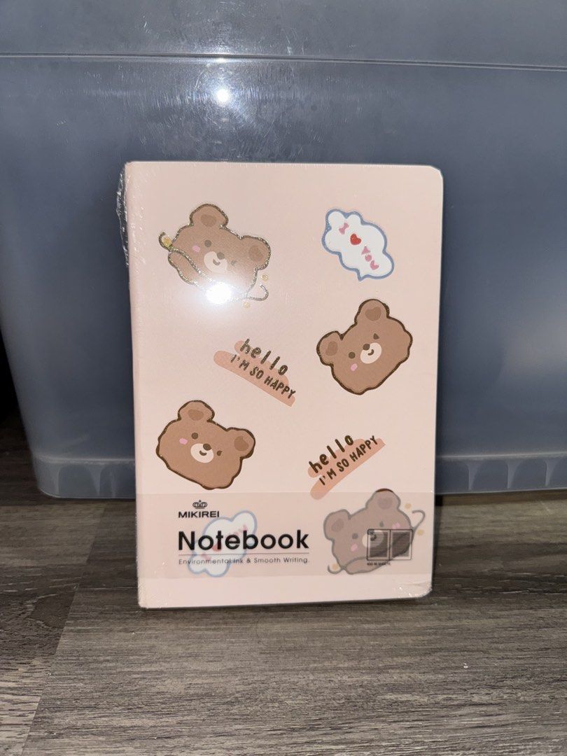 MIKIREI Notebook with Cute Bear Stickers (Category: Stationery & School Supplies) located in Singapore. Submitted by athenafrappe (Listing ID 1440535731, Image 1). Description: - Brand new MIKIREI pink notebook - Adorable all-over bear sticker design - Cover message: ' I'M SO HAPPY' & 'I ❤️ YOU' - Smooth writing paper inside - Ideal for notes, journaling, or as a gift - Still in original plastic wrap.
