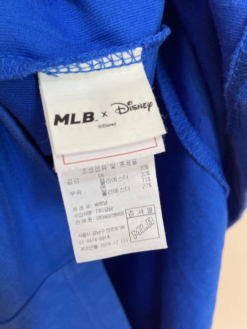 MLB x Disney Mickey Mouse Blue T-shirt Size Medium (Category: Tshirts & Polo Shirts ) located in Santiago. Submitted by mfdthriftstore (Listing ID 1440459039, Image 3). Description: - Blue MLB x Disney T-shirt - Features a Mickey Mouse graphic on the chest - Size: Medium - Made in Vietnam - Condition: Great, no issues found - Perfect for Disney and MLB fans.