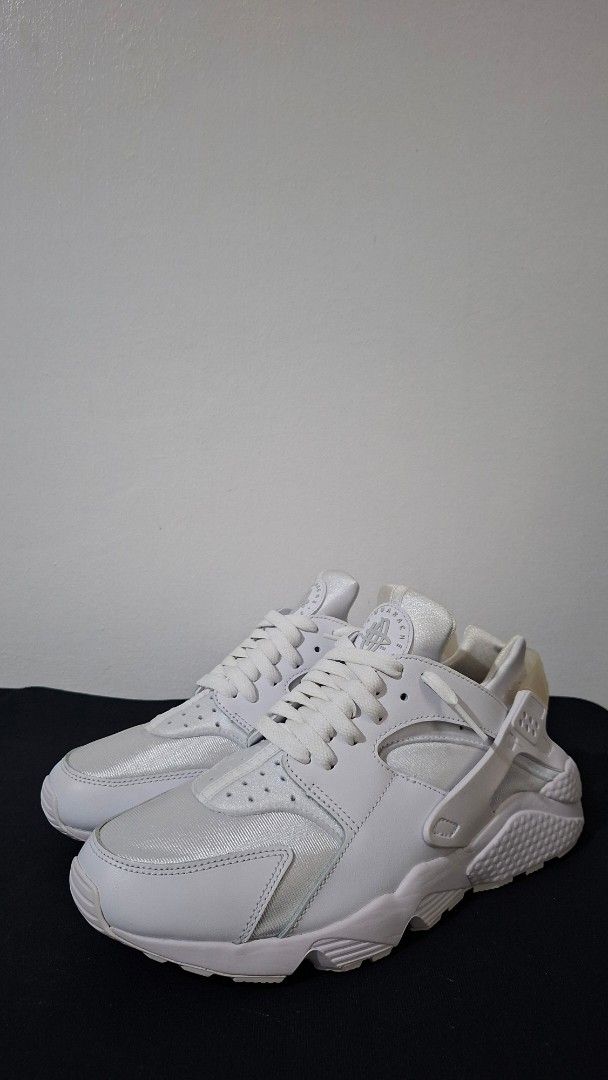 Price Drop! Nike Air Huarache White Sneakers (Category: Sneakers) located in Imus. Submitted by pick_and_dig (Listing ID 1440493217, Image 1). Description: - Original listed price: P5,000 Price Drop: P4,500 - White Nike Air Huarache sneakers - Classic design with iconic Huarache strap - All white colorway - Versatile for casual wear or sports - Comfortable and stylish Note: As is. WYSIWYG. Additional photos available upon request. Mode of Payment