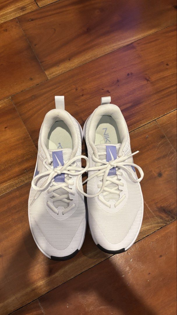 Nike MC Trainer 3 Metcon (Category: Sneakers) located in Muntinlupa City. Submitted by sehbulok (Listing ID 1440467922, Image 2). Description: - White Nike sneakers - Lavender swoosh detail - Lace-up closure - Breathable mesh upper - Durable rubber outsole for grip - Size: EU 39 / US Women's 8.5 - Ideal for workouts and casual wear - Like new used less than 10 times - No box included.