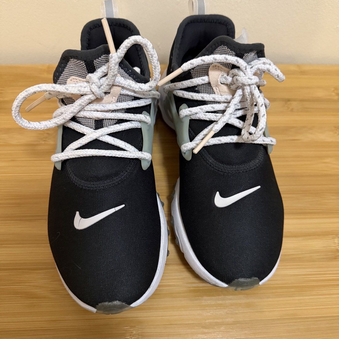Nike Presto Running Shoes Black White (Category: Sneakers) located in Bulacan. Submitted by declutter_diary02 (Listing ID 1440430594, Image 2). Description: - Nike Presto Shoes - Color: Black with White Laces & Accents - Size: US Women's 6 - Ideal for: Running or Casual Wear - Features: Comfortable and Stylish - No box.