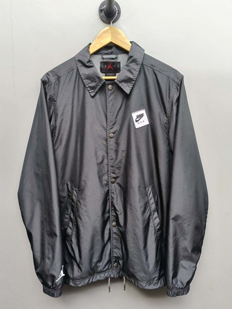 Nike x Jordan Smoke Gray Classic Coach Jacket (Category: Coats, Jackets and Outerwear) located in Taguig. Submitted by _theroom.ph (Listing ID 1440484500, Image 2). Description: - Grey Jordan coach jacket - Features Jumpman logo on front - "AIR JORDAN" graphic on back - Standard fit - Lightweight material - Button-up front with pockets - Made in Vietnam Nike x Jordan Smoke Gray Classic Coach Jacket Size XS Fits Medium 28 x 20.5 Excellent Conditio