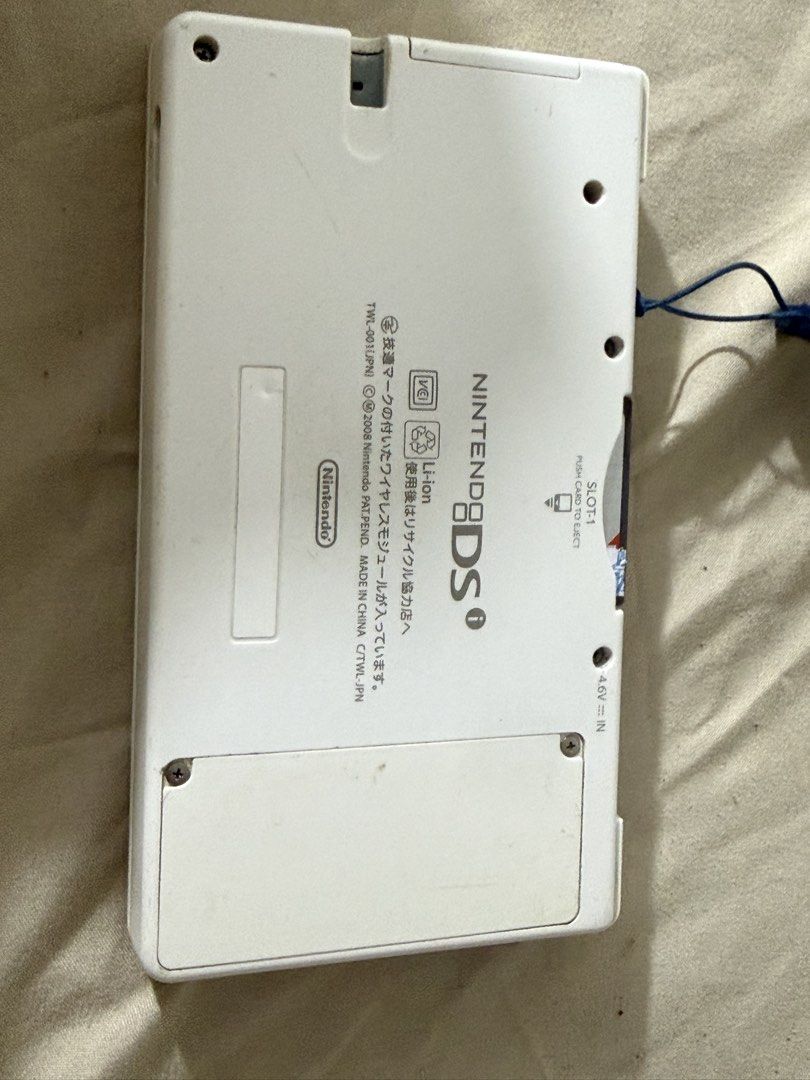 Nintendo DSI English (Category: Nintendo) located in Taguig. Submitted by prelovedbyjhessa (Listing ID 1440404723, Image 3). Description: - Nintendo DSi console - Color: White - Language: English - Condition: Good, pre-owned - Perfect for portable gaming and classic Nintendo titles with R4 and charger.