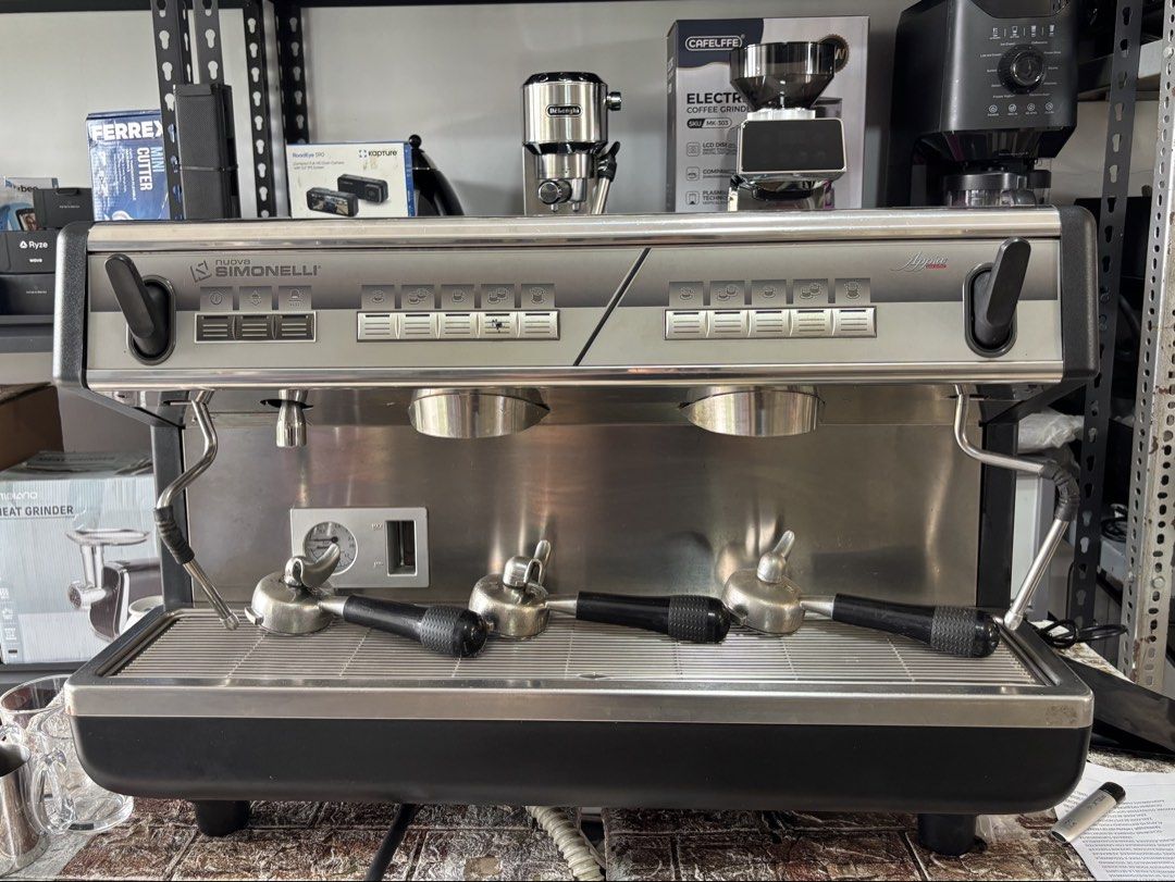 Nuova Simonelli appia Espresso Machine (Category: Coffee Machines & Makers) located in Pulilan. Submitted by sebbii (Listing ID 1440505692, Image 1). Description: - Commercial-grade dual group head espresso machine - Includes multiple portafilters - Powerful steam wand for perfect milk frothing - Ideal for cafes or dedicated home baristas - Ready to brew and serve delicious coffee.