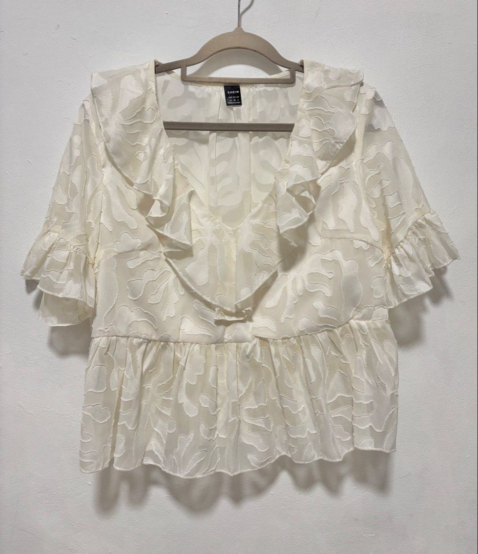 Off White Vneck Blouse (Category: Blouses) located in Davao. Submitted by outoftheclosetdvo (Listing ID 1440543743, Image 1). Description: Fits medium to large.