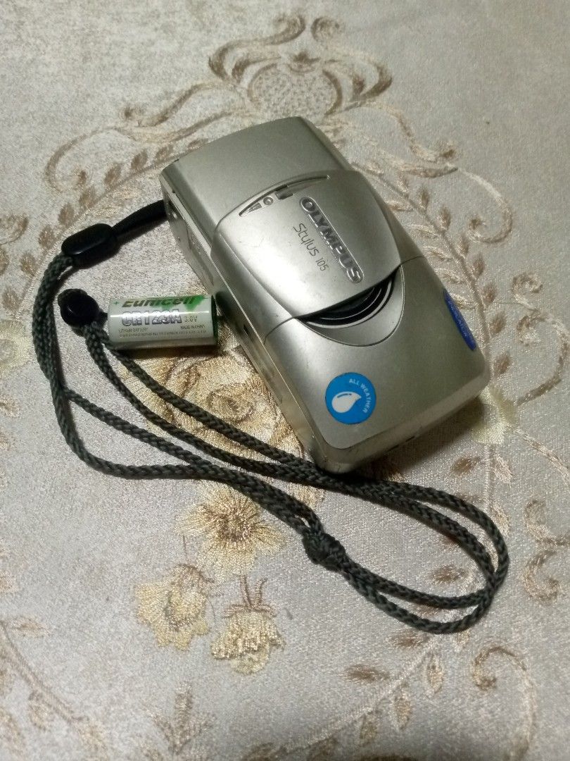 Olympus Stylus 105 Film Camera (Category: Cameras) located in Manila. Submitted by bobby_nebab (Listing ID 1440389905, Image 1). Description: Items is in good working condition ,second hand. All function are working clean view finder. Battery,strap and pouch included DM sa intresado 09231015528 .