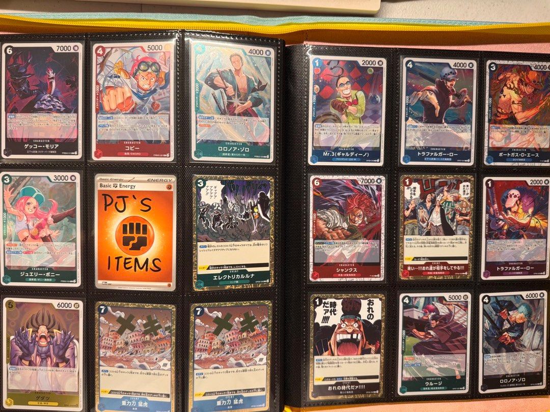 One Piece Card Game Cards TCG set (Category: Raw Singles) located in Quezon City. Submitted by pjsitems (Listing ID 1440422859, Image 1). Description: Take all 1350 Gecko Moria - 160 Coby - 200 Zoro - 200 Bonney - 85 Electrical Luna - 160 Gedatsu - 50 Gravity Knife - 85 ea Mr. 3 - 50 Trafalgar Law (row 1) - 50 Ace - 85 Shanks - 85 Come on! We’ll Fight You! - 50 Law (row 2) - 50 Teach / Blackbeard - 50 Urouge - 50 Zoro - 50.