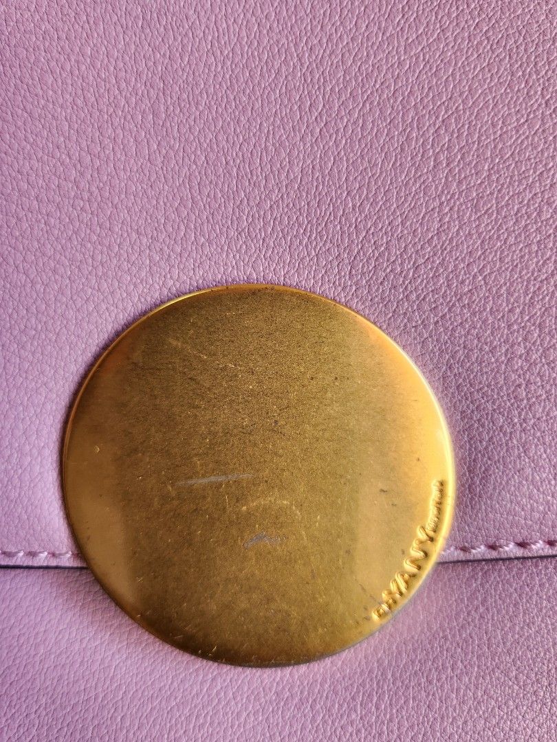 Oryany Lottie Saddle Crossbody Small Handbag. (Category: Cross-body Bags) located in Caloocan City. Submitted by xcessbaggs (Listing ID 1440539216, Image 3). Description: New Arrival!!! In good preloved condition from Korea. Design Features:Half-circle saddlebag silhouetteSignature large gold-tone round disk closure -Removable and adjustable leather crossbody strap -Magnetic button snap closure under the flap -Back exterior zipper pocket and inte