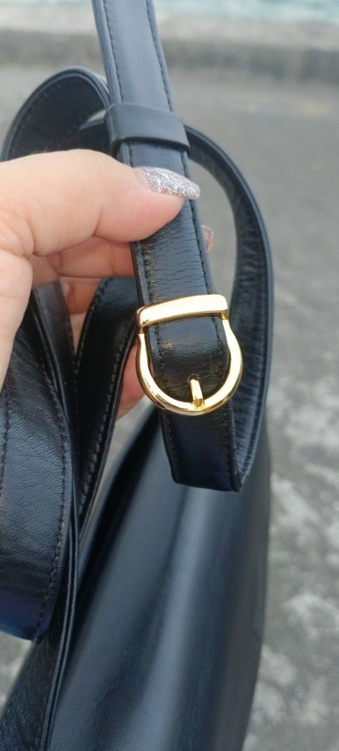 Pierre Balmain Paris Black Leather Bag (Category: Luxury Bags & Wallets) located in Legazpi City. Submitted by georgepineda791 (Listing ID 1440517605, Image 3). Description: - Authentic Pierre Balmain Paris black leather shoulder bag. - Elegant curved flap design. - Adjustable shoulder strap with a classic gold buckle. - with interior pockets for organization. - Versatile: suitable for daily use or special events. - Condition: Clean and well-main