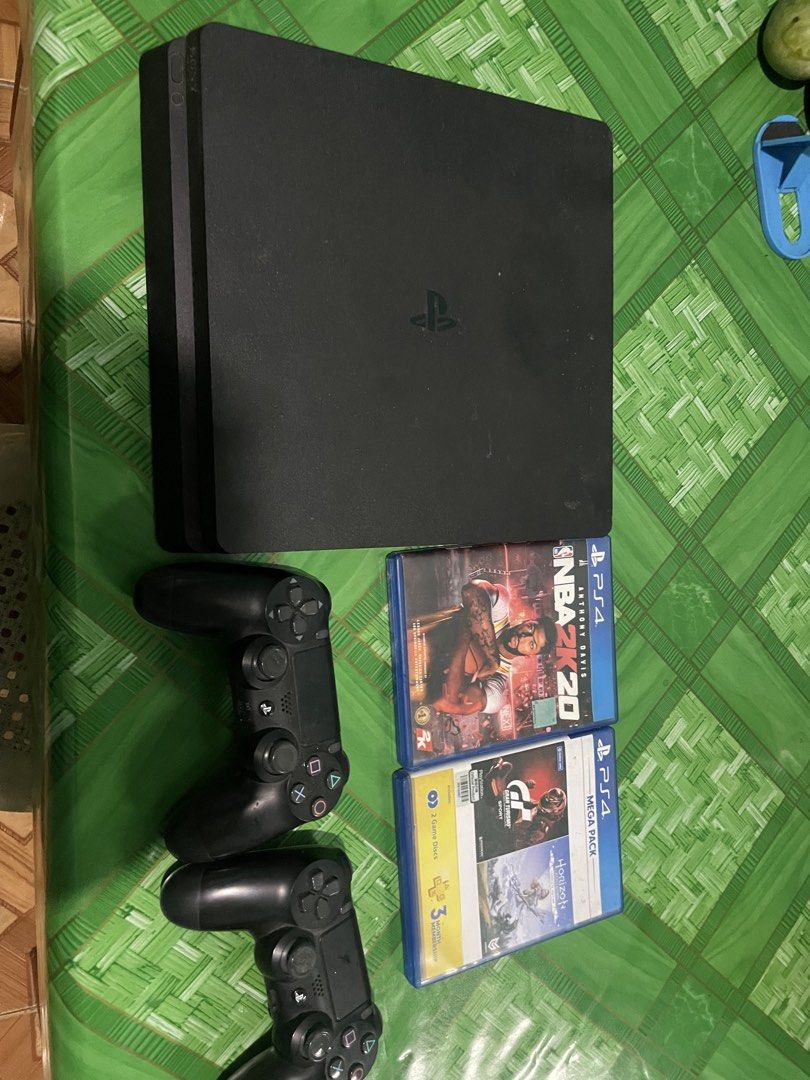 PlayStation 4 (PS4) Slim Console with 2 Controllers & Games (Category: PlayStation) located in Quezon City. Submitted by bulacanand56934 (Listing ID 1440527119, Image 1). Description: - PS4 Slim Console - Two (2) DualShock 4 Controllers - Three (3) Games Included: - NBA 2K20 - Gran Turismo Sport - Horizon Zero Dawn Complete Edition - Both Controllers has minor stick drift - Ready for immediate gaming! - Open for swap to nintendo switch - Digital 
