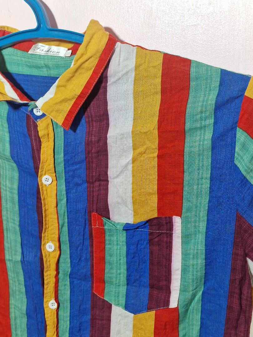Plus size rainbow Striped Short Sleeve Button Up Shirt (Category: Shirts) located in Mandaluyong City. Submitted by kitzigzag (Listing ID 1440558432, Image 2). Description: - Colorful striped short sleeve shirt - Left chest pocket - Button up front - Size: 3X - Measurements: Width 27.5", Length 27.5" MOP: GCASH Delivery via lalamove or gogo express .