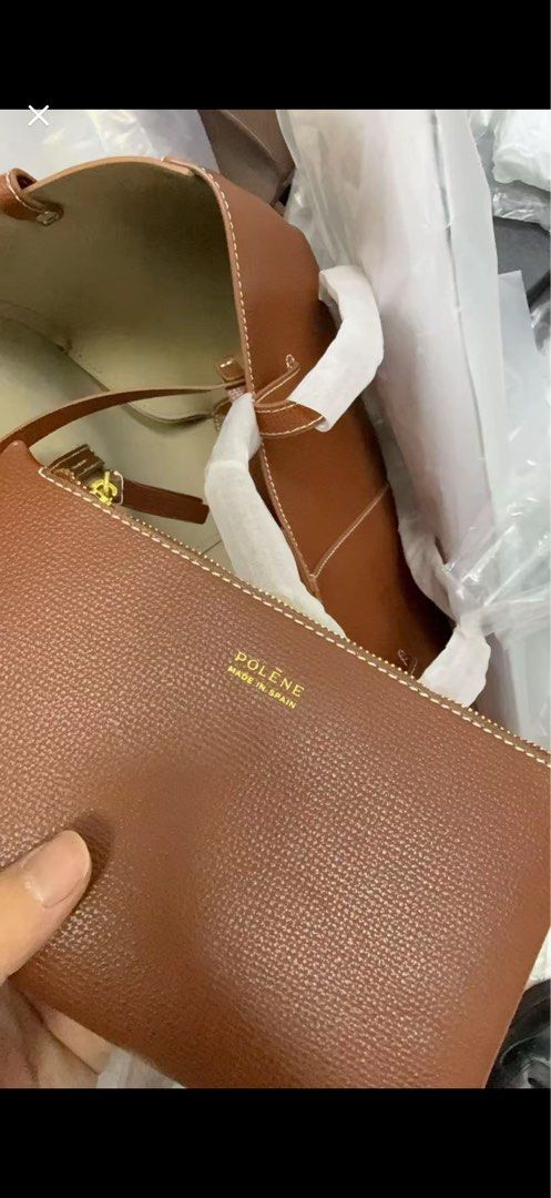Polene Cyme Camel from GaryZ Bags (Category: Tote Bags) located in Lucena. Submitted by mademoisellemd (Listing ID 1440402804, Image 2). Description: Polene Cyme Large in Camel Genuine Leather Bought from Gary Z Bags sa TikTok shop. Bought for 4k+ Selling lang for 2800 Rfs di nagagamit Only flaw is yung peeling sa magnet area.