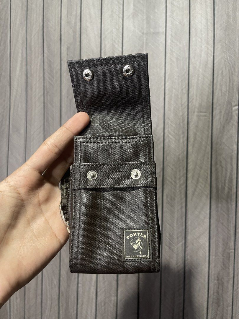 Porter International Leather Mini Utility Pouch (Category: Belt bags, Clutches and Pouches) located in Santa Cruz. Submitted by hongkongmarketph (Listing ID 1440534499, Image 2). Description: Porter International Leather Mini Utility Pouch Authentic Porter International compact pouch made with textured leather finish. Perfect for small essentials like cards, keys, earphones, coins, or small gadgets. *Features: • Snap button closure • Metal carabi