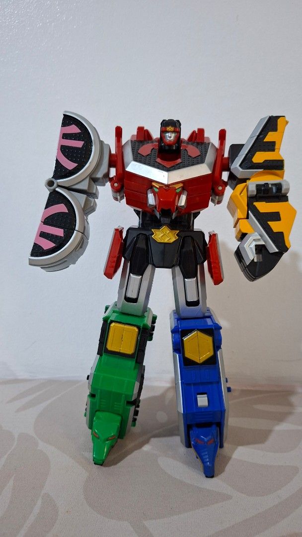 Price Drop! Power Rangers Megazord Toy - Multi-colored (Category: Action & Battle Toys) located in Imus. Submitted by pick_and_dig (Listing ID 1440463105, Image 1). Description: - Original listed price: P3,500 Price Drop: P3,000 - Multi-colored toy robot - Megazord-inspired design - Composed of several smaller, combinable robot parts - Features red, yellow, blue, green, and black colors - Ideal for Power Rangers enthusiasts and collectors Note: A