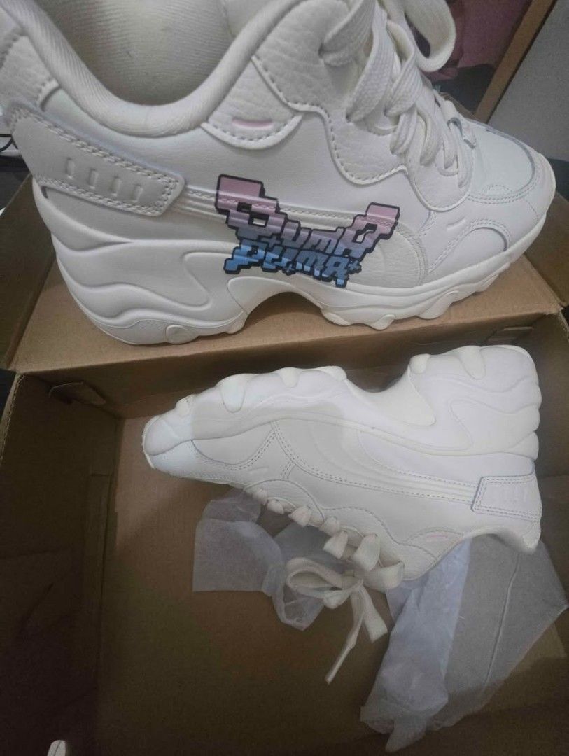 Puma Pulse Wedge Wmn "Pixel" Sneakers Cream (Category: Sneakers) located in Las Pinas. Submitted by dar606 (Listing ID 1440539351, Image 3). Description: - Cream Puma Pulse Wedge sneakers - Size: 5.5 UK / 38.5 EU - Fun pixelated "Puma Puma" logo on the side - Chunky sole for added height and comfort - Includes original box.