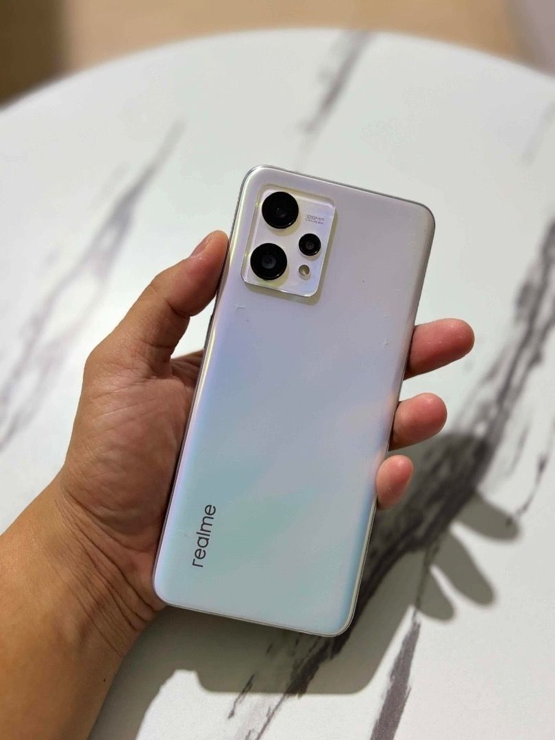 Realme 9 (Category: Realme) located in Quezon City. Submitted by quinzstacey_617 (Listing ID 1440549814, Image 2). Description: - Brand: Realme - Model: Realme 9 - Display: 6.4-inch screen - Battery: 5000mAh capacity - Rear Camera: 108MP main + 8MP + 2MP - Front Camera: 16MP - RAM: 6GB - Storage: 128GB - Software: Realme UI 3.0 - Condition: Pre-loved, good working condition - Included: Free black phone case.