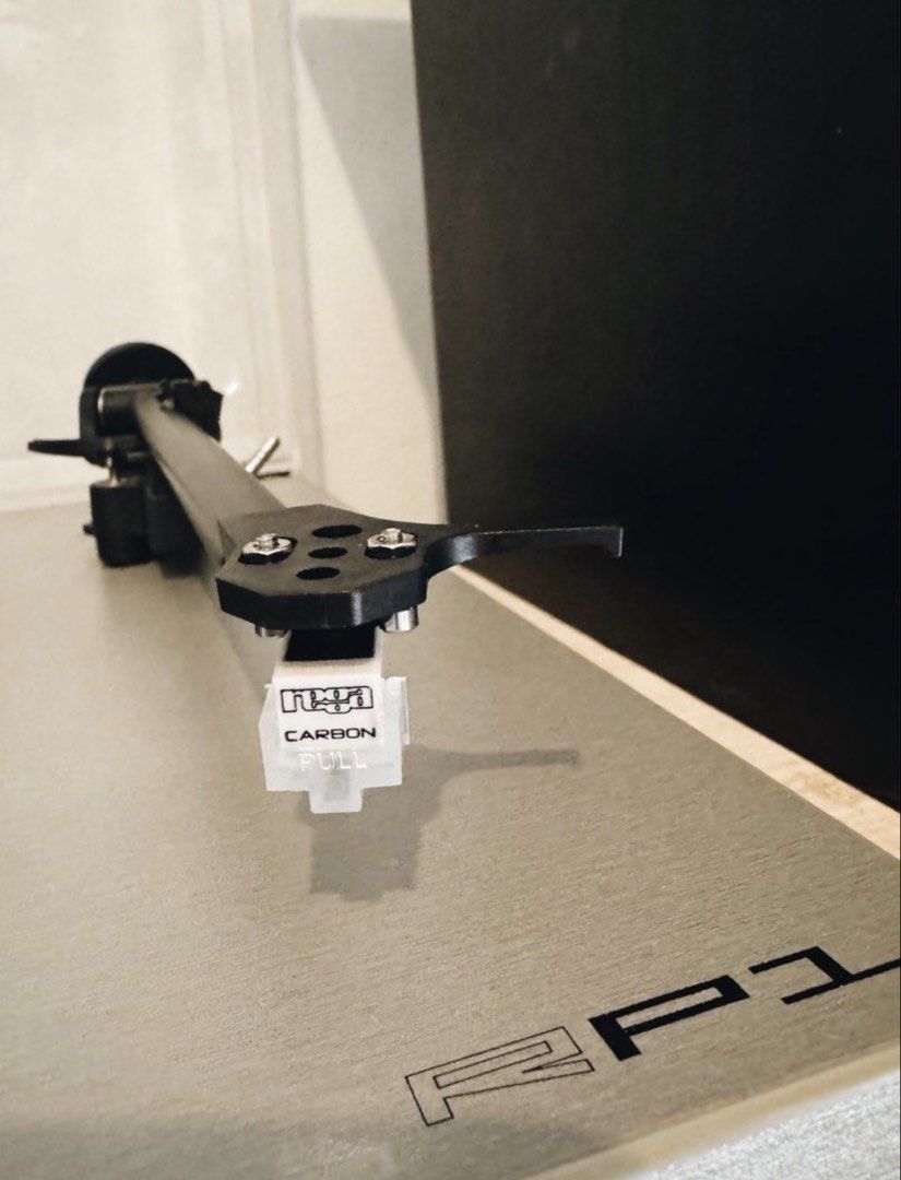 REGA RP1 (Category: Other Audio Equipment) located in General Trias. Submitted by frommetoyouthings (Listing ID 1440390576, Image 2). Description: The Rega RP1 is an award-winning, entry-level belt-drive turntable celebrated for its exceptional British-made build and "Rega sound". Tonearm: Hand-assembled RB101 tonearm featuring fantastic bearings with minimal chatter. Cartridge: Pre-fitted with the Ortofon OM 5E moving-magnet cartridge. Platter: 