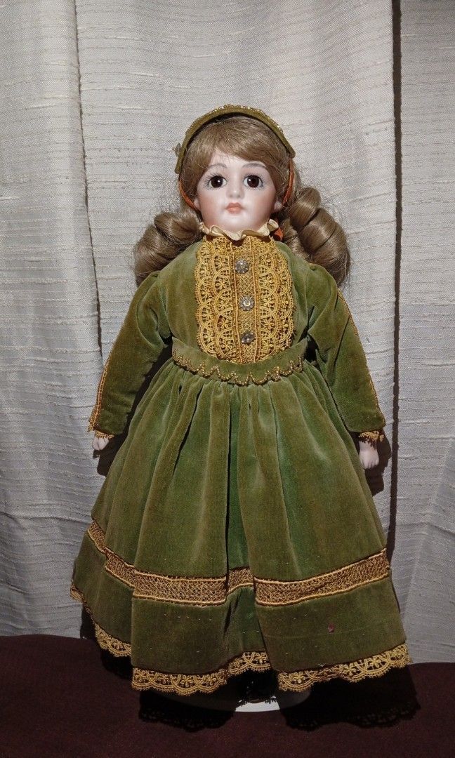 Repro bisque doll (Category: Vintage Collectibles) located in Manila. Submitted by kaykay_ichimatsu666 (Listing ID 1440490584, Image 1). Description: For sale vintage repro bisque circa 1980's - 1990's around 14" bisque head and hand cloth body and feet (stand included) pm if interested🖤✨ Location: Valenzuela.