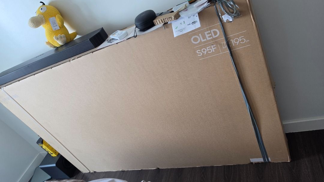 Samsung S95F 77" OLED (Category: TV) located in Manila. Submitted by goldenrabbit_abd18b (Listing ID 1440461590, Image 2). Description: Selling a completely unused, flagship 77-inch Samsung S95F QD-OLED TV. This was bought for a project/setup but is no longer needed, so I'm letting it go to free up extra funds. It was only unboxed once strictly to test for shipping damages and dead pixels (it is absolutely flawless, zero hours of actual use). All