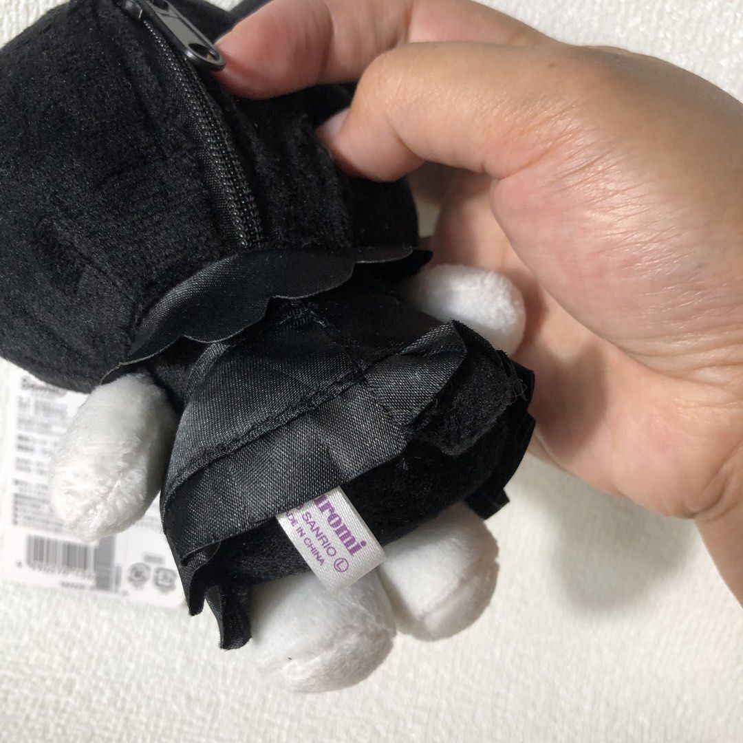 Sanrio Kuromi Plush Keychain Pouch (Category: Plushies & Soft Toys) located in Manila. Submitted by mekabee_moon (Listing ID 1440487742, Image 3). Description: - Adorable Sanrio Kuromi plush pouch - Stylish black and white design with a cute skull detail - Secure zipper closure for your essentials - Includes a ball chain for easy attachment as a bag charm - Perfect for organizing small items on the go - Made in China.