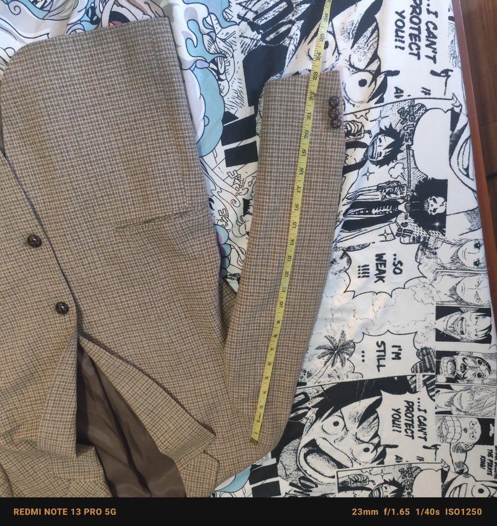 Savola Men's Tweed Blazer Jacket (Category: Coats, Jackets and Outerwear) located in Manila. Submitted by buyybustt (Listing ID 1440473187, Image 3). Description: - Classic tweed blazer from Savola - Subtle brown & beige houndstooth pattern - Two-button closure with notched lapels - Fully lined interior - Perfect for smart casual or formal wear - Measurements available on the pic Pristine Condition!!!.