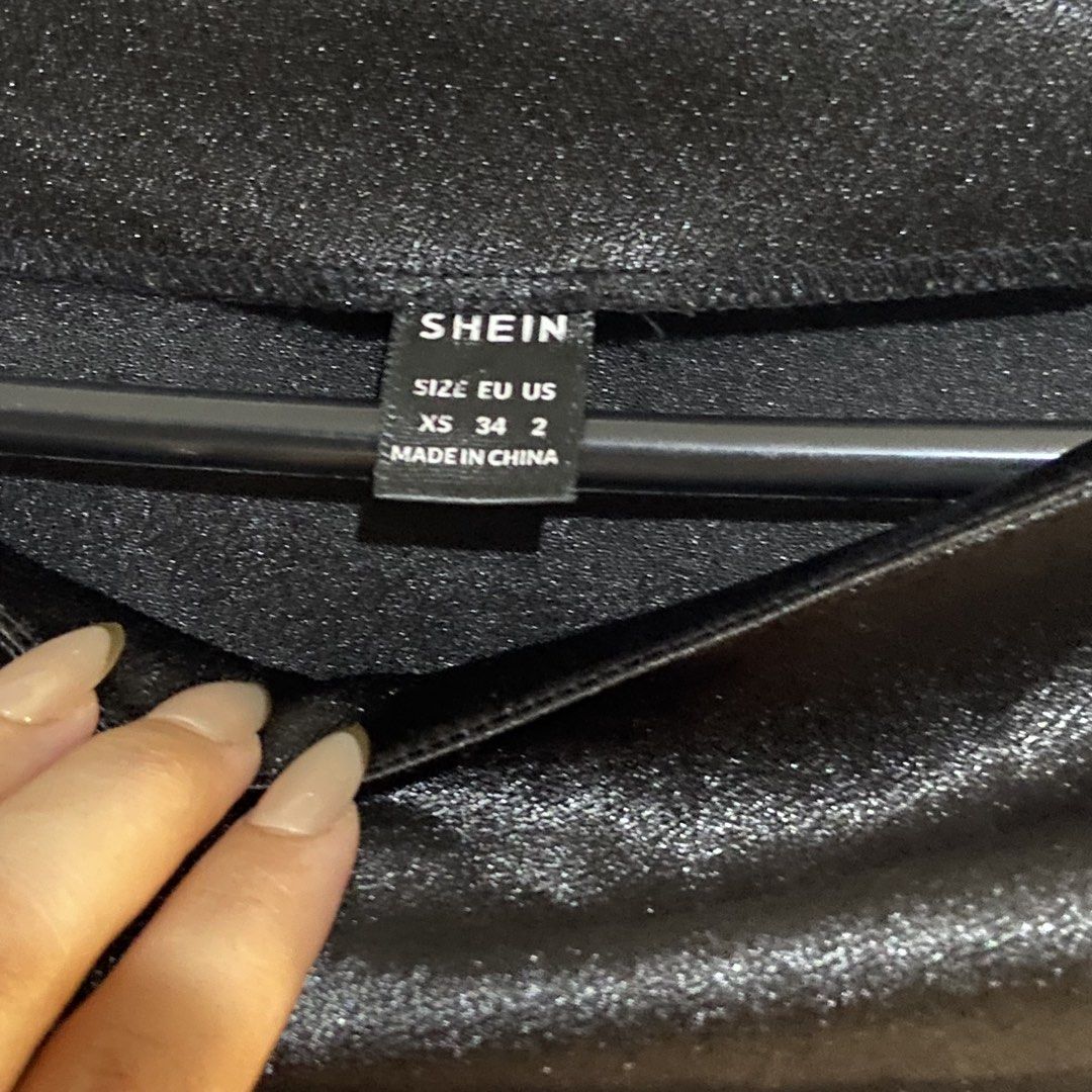 SHEIN Black Satin Midi Skirt (Category: Skirts) located in Bulacan. Submitted by dumpcloset (Listing ID 1440494326, Image 3). Description: SHEIN - size S on tag satin fabric side zip closure ideal for dinner, dates, night out dimensions: waist 27 length 28 📌 NO when worn ship via j&t loc bulacan.