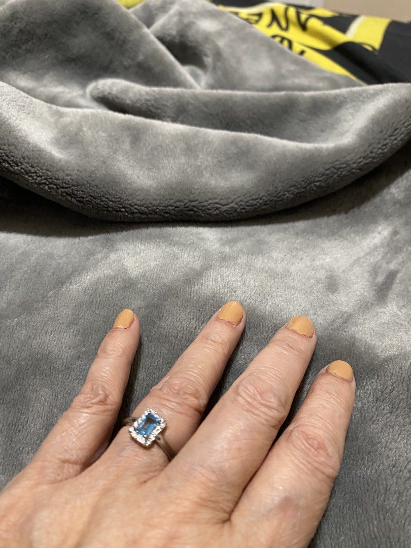 Silver Ring with Blue Stone and White Accents (Category: Rings) located in Manila. Submitted by robinhood123_134 (Listing ID 1440510791, Image 3). Description: - Elegant silver-toned ring - Features a striking rectangular blue stone - Accented with sparkling small white stones - Estimated size 6 or 7 - Versatile for everyday wear or special events - Feel free to ask any questions!.