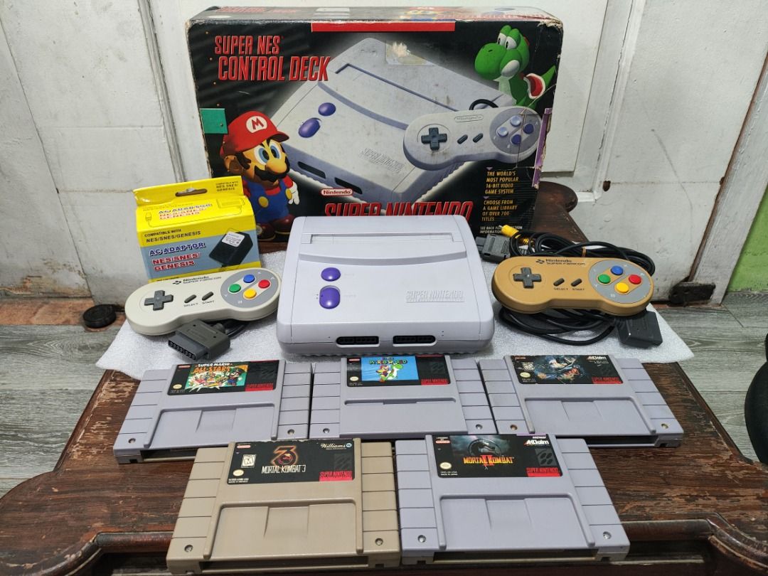 SNES Jr. - Super Nintendo Entertainment System Jr. Console w/ Box [Bundle #9] (Category: Nintendo) located in Quezon City. Submitted by yinyinyang69 (Listing ID 1440498088, Image 1). Description: SNES Jr. - Super Nintendo Entertainment System Jr. Console w/ BOX [Bundle #9] [Price]: 11,999 php [Bundle Includes]: Original and Authentic Nintendo~ - Super Nintendo SNES Jr. Unit - 2x Super Famicom Controller - Audio Video Cable - 220v AC Adapter (bran