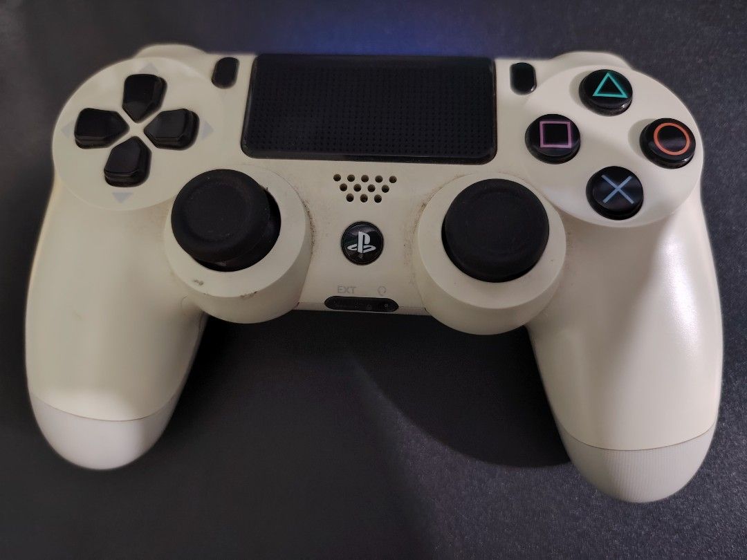 Sony PlayStation 4 DualShock 4 Wireless Controller - White (Category: Controllers) located in Manila. Submitted by lemsgadgetszone (Listing ID 1440388691, Image 1). Description: - White PS4 Controller - Fully functional, works well - Responsive buttons and joysticks - Ideal for gaming - Selling due to setup upgrade.