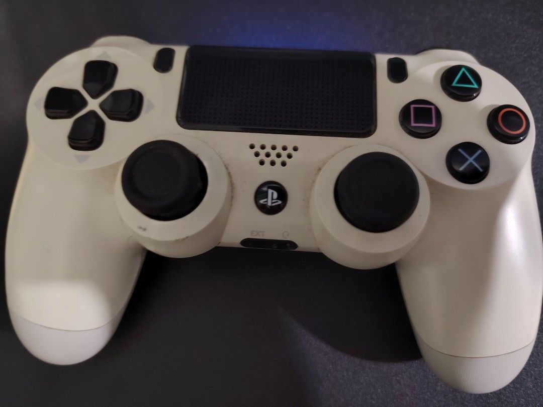Sony PlayStation 4 DualShock 4 Wireless Controller - White (Category: Controllers) located in Manila. Submitted by lemsgadgetszone (Listing ID 1440388691, Image 3). Description: - White PS4 Controller - Fully functional, works well - Responsive buttons and joysticks - Ideal for gaming - Selling due to setup upgrade.