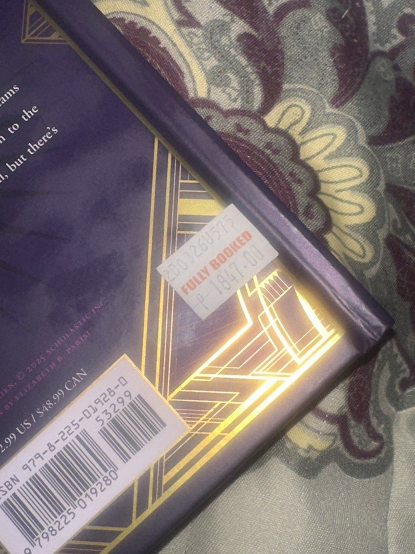 Sunrise on the Reaping by Suzanne Collins (Category: Storybooks) located in Zamboanga. Submitted by lei_s_closet (Listing ID 1440459916, Image 2). Description: - Hardcover edition of Sunrise on the Reaping by Suzanne Collins. - Features a beautiful art deco-inspired cover design. - Includes floral accents and a phoenix emblem. - A must-have for any fan's collection. - Ideal for readers who love dystopian fiction and captivating stories..