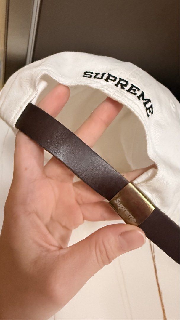 Supreme Rubber Logo 6-Panel Cap (Category: Caps & Hats) located in Taguig. Submitted by aa_decluttering (Listing ID 1440478209, Image 2). Description: Condition: Brand New Unused Logo: Iconic red rubberized logo on the front. Back Detail: Embroidered Supreme branding at the rear. Closure: Genuine leather adjustable strap (One size fits all). Material: Durable cotton canvas. Pickup: Kapitolyo Pasig Shipping fee c/o buyer.