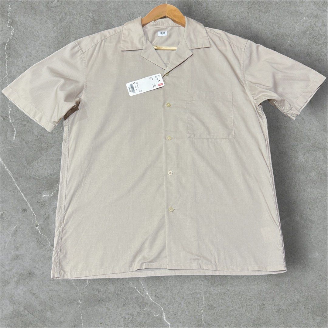 Uniqlo Open Collar (BRANDNEW) (Category: Formal Shirts) located in Cavite. Submitted by igiboybthn (Listing ID 1440519792, Image 1). Description: Uniqlo Open Collar (BRANDNEW) Small Beige Dimensions: 21.5” x 27.5” 💸 GCash / Bank Transfer 🚚 J&T | Lalamove 📦 Shipping fee c/o buyer 📍Bacoor Cavite NOTE: Color may vary due to lighting DM if interested.