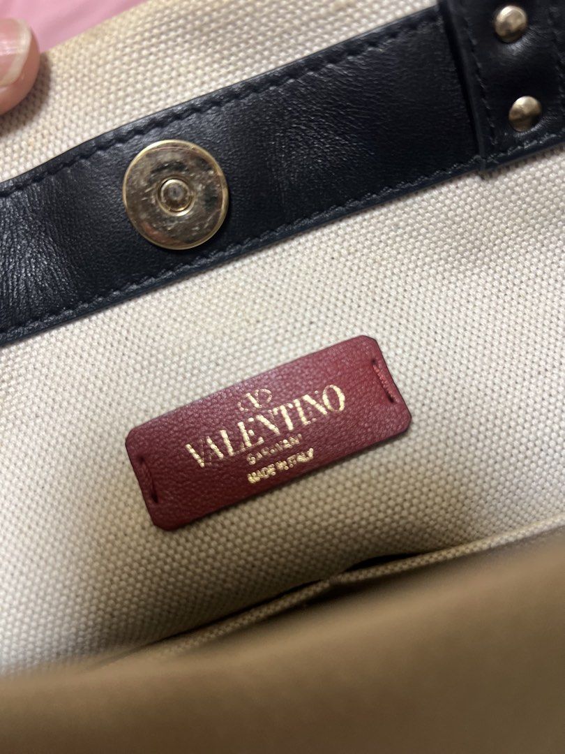 Valentino VLTN Canvas Tote Bag (Category: Luxury Bags & Wallets) located in Manila. Submitted by aliyahkennedy (Listing ID 1440523140, Image 3). Description: - Authentic Valentino tote bag - Features prominent VLTN logo - Made in Italy - Comes with Entrupy authenticity card - Ideal for everyday use or travel - Spacious interior.