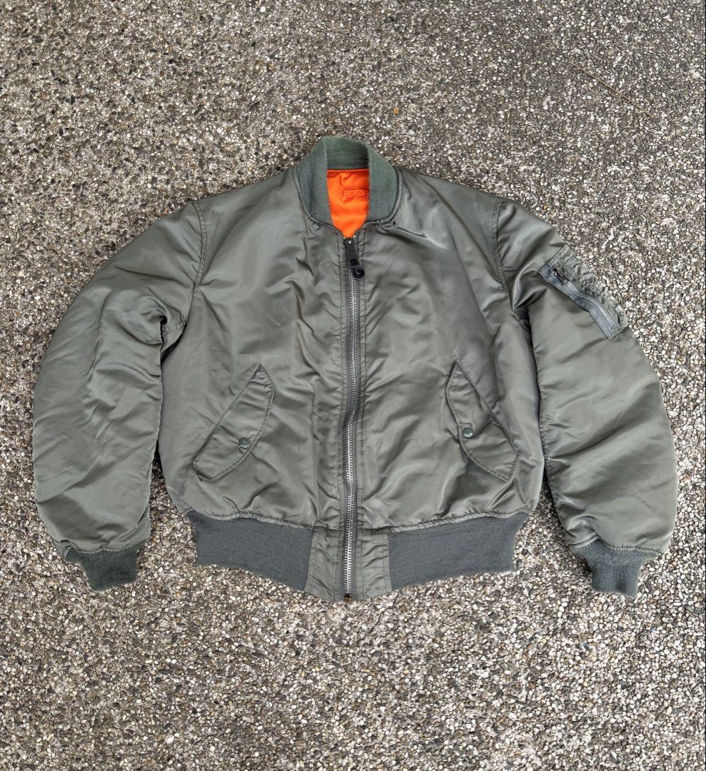 Vintage Alpha Industries MA-1 Bomber Jacket (Category: Coats, Jackets and Outerwear) located in Quezon City. Submitted by though.bare (Listing ID 1440500153, Image 1). Description: Fits on L up to XL for Men In good, worn condition. See photos for flaws. Width : 26" Length : 24.5" Sleeve : 24.5" Shoulder : 19.5" No-when worns. Listings not marked sold/reserved are available. These are preloved/used items, manage expectations. Visit my profile for