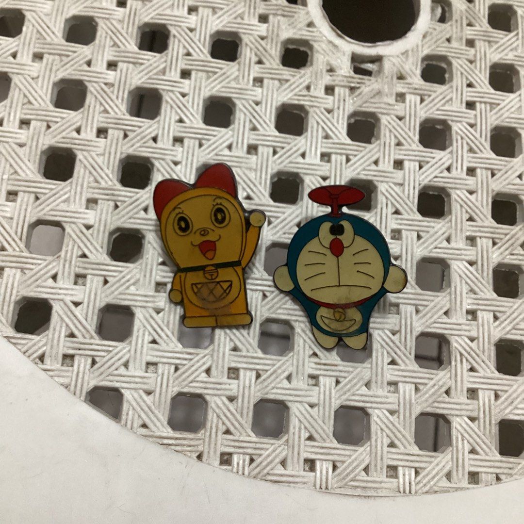 Vintage Doraemon & Dorami Enamel Pin Set (Category: Character Goods) located in Caloocan City. Submitted by lostrtrp (Listing ID 1440463026, Image 1). Description: - Adorable Doraemon and Dorami enamel pin set. - Perfect for personalizing bags, jackets, and hats. - Features secure backings for a reliable hold. - A must-have collectible for any Doraemon fan..