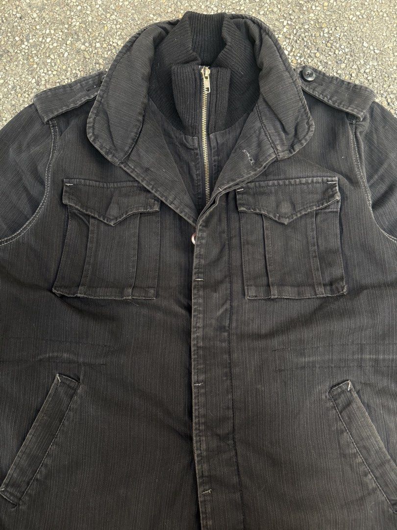 Vintage Jungle Storm Washed Black Field Jacket (Category: Coats, Jackets and Outerwear) located in Quezon City. Submitted by though.bare (Listing ID 1440439047, Image 2). Description: Fits on M-L for Men In worn condition. See photos, one shoulder button needs to be sewn back on (loosened) Width : 22" Length : 27" Sleeve : 25" Shoulder : 18.5" No-when worns. Listings not marked sold/reserved are available. These are preloved/used items, manage ex