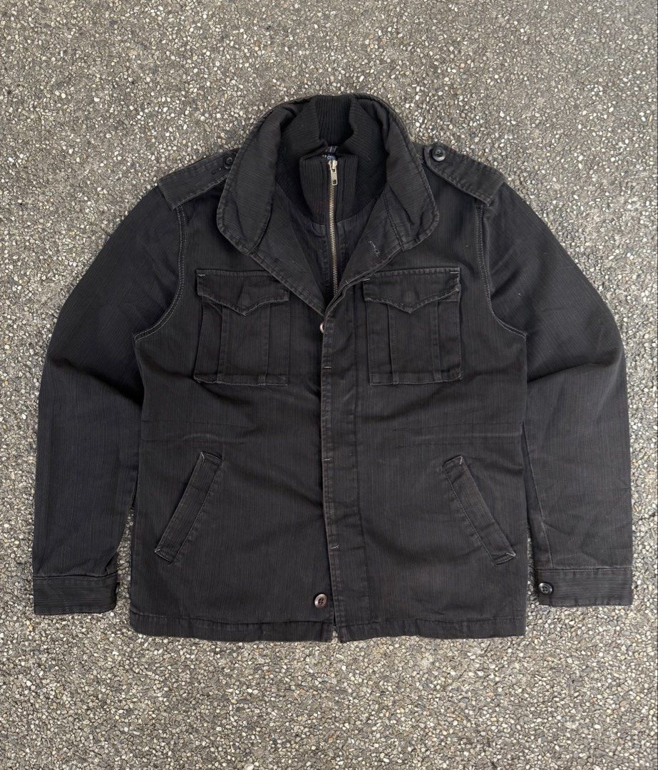 Vintage Jungle Storm Washed Black Field Jacket (Category: Coats, Jackets and Outerwear) located in Quezon City. Submitted by though.bare (Listing ID 1440439047, Image 1). Description: Fits on M-L for Men In worn condition. See photos, one shoulder button needs to be sewn back on (loosened) Width : 22" Length : 27" Sleeve : 25" Shoulder : 18.5" No-when worns. Listings not marked sold/reserved are available. These are preloved/used items, manage ex